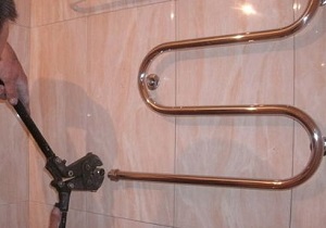 Демонтаж полотенцесушителя в ванной в Среднеуральске